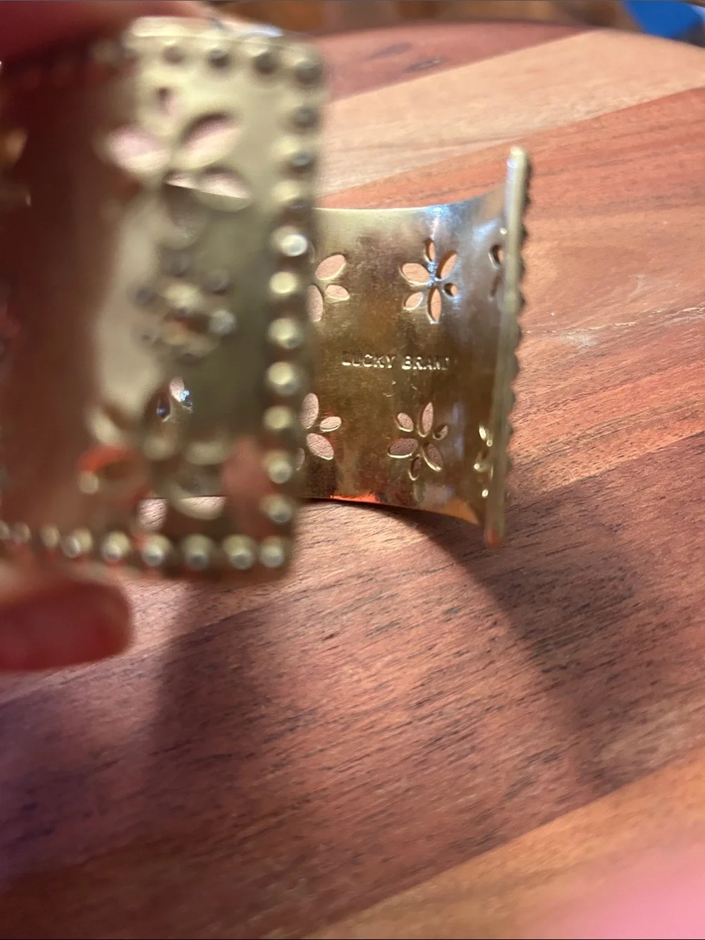 Lucky gold-tone floral cutout cuff bracelet intricate medallion center